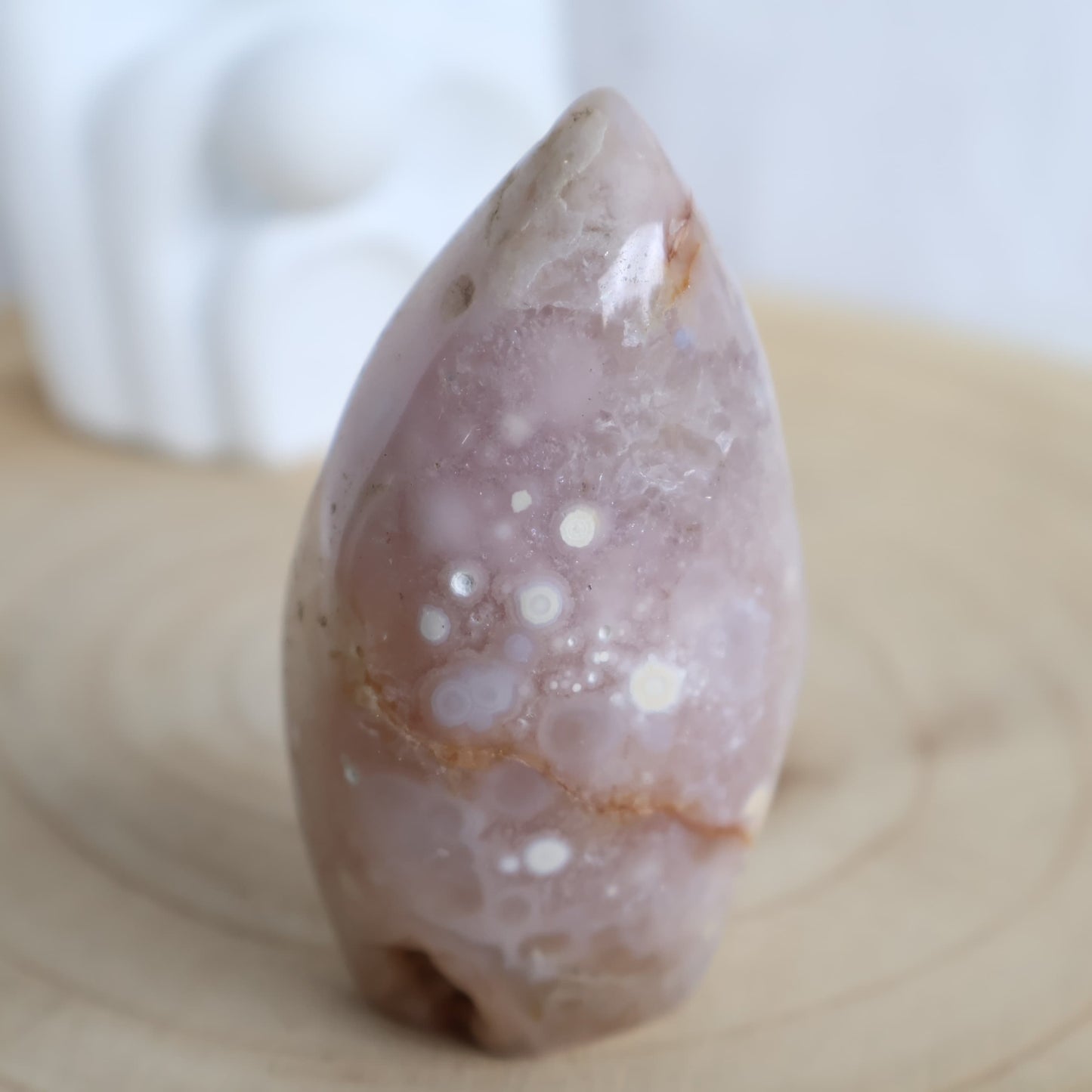 Flower Agate freeform with soft muted tones and natural floral-like plume patterns, polished into a smooth 7.5cm display piece.
