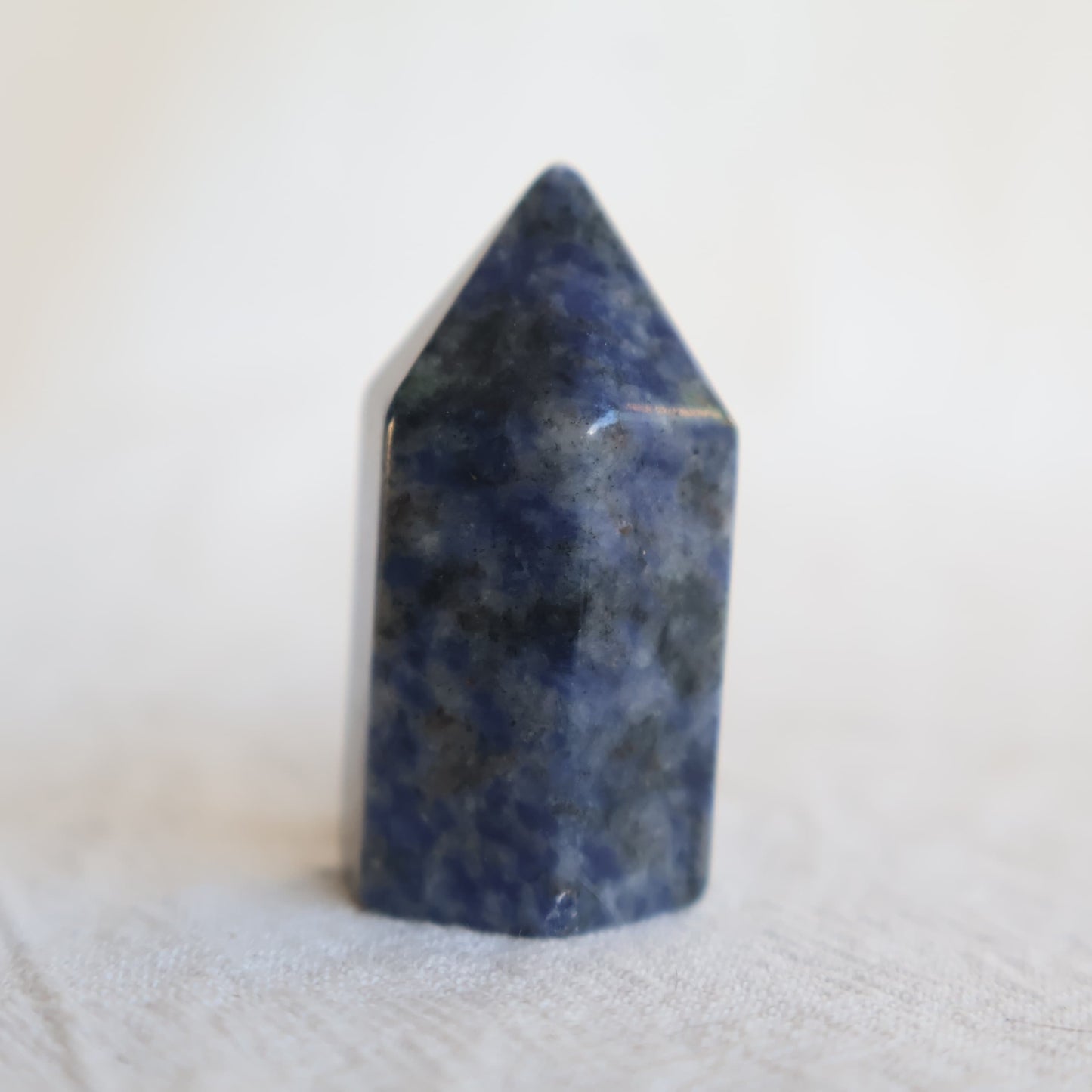 Collection of mini crystal generators available in Phoenix Stone, Rose Quartz, Pyrite, Moss Agate, and Sodalite with polished pointed tops and natural colour variations.
