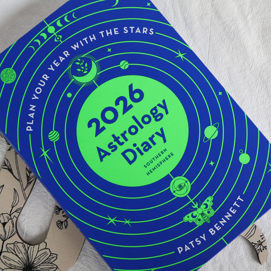 2026 Astrology Diary with blue and green design on a light gray background