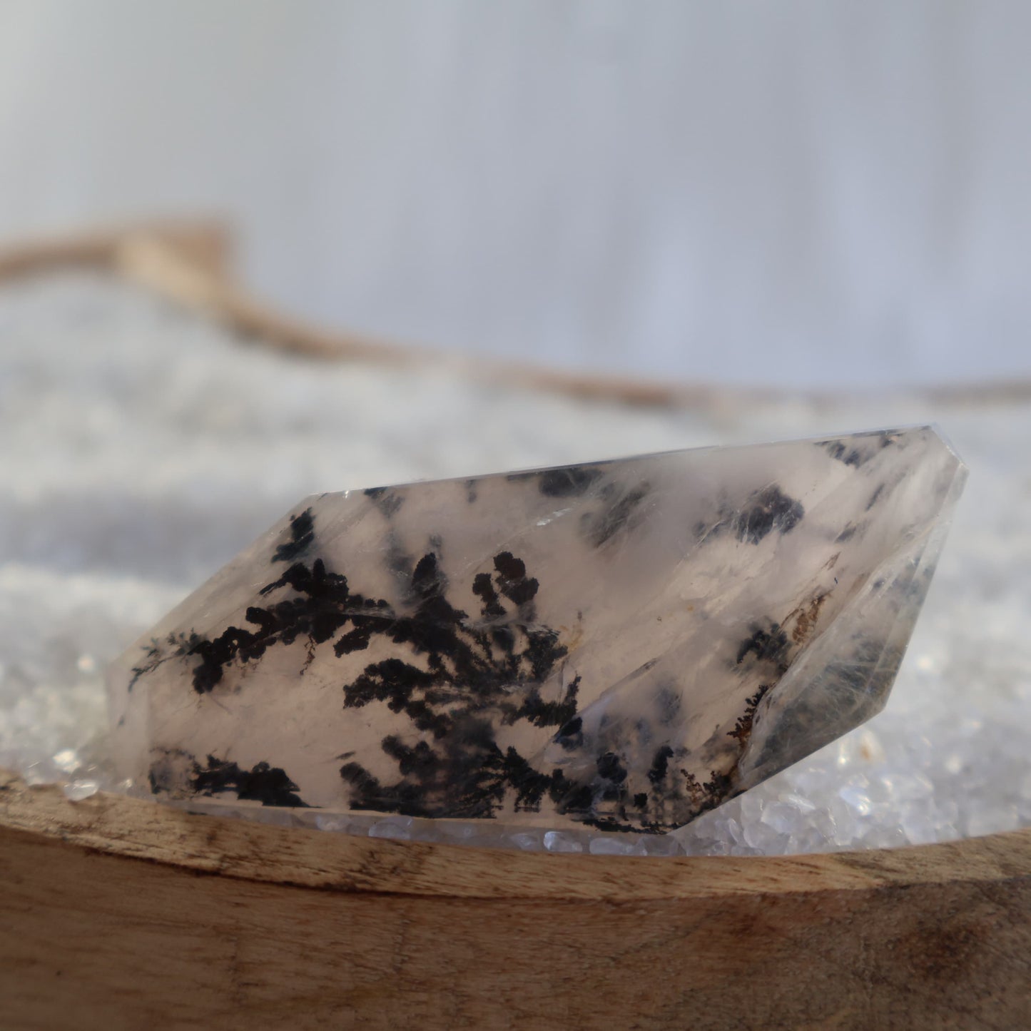 dendritic agate freeform with dark branch like inclusions in translucent stone