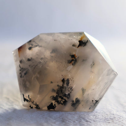 dendritic agate freeform with dark branch like inclusions in translucent stone