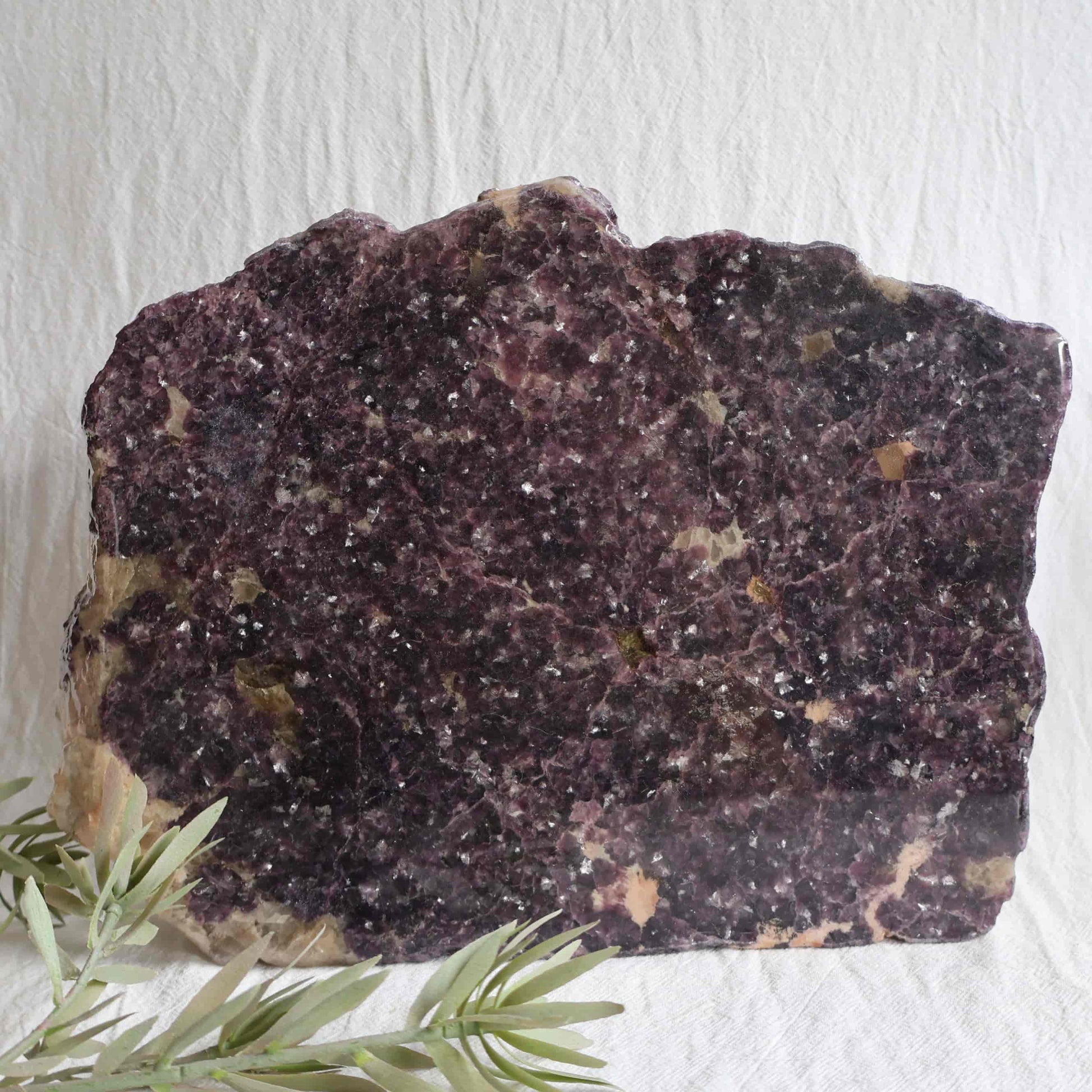 XXXL Lepidolite freestanding slab with deep plum and mauve colouring, sparkling mica detail and polished acrylic-coated face, weighing 5.09kg