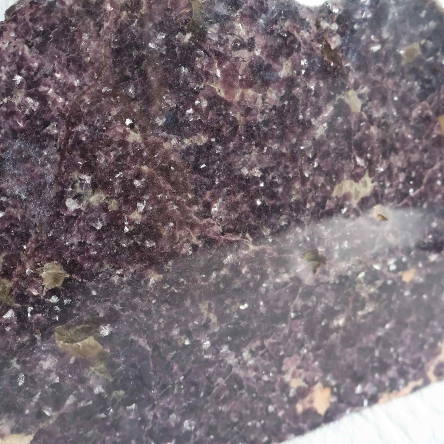 XXXL Lepidolite freestanding slab with deep plum and mauve colouring, sparkling mica detail and polished acrylic-coated face, weighing 5.09kg