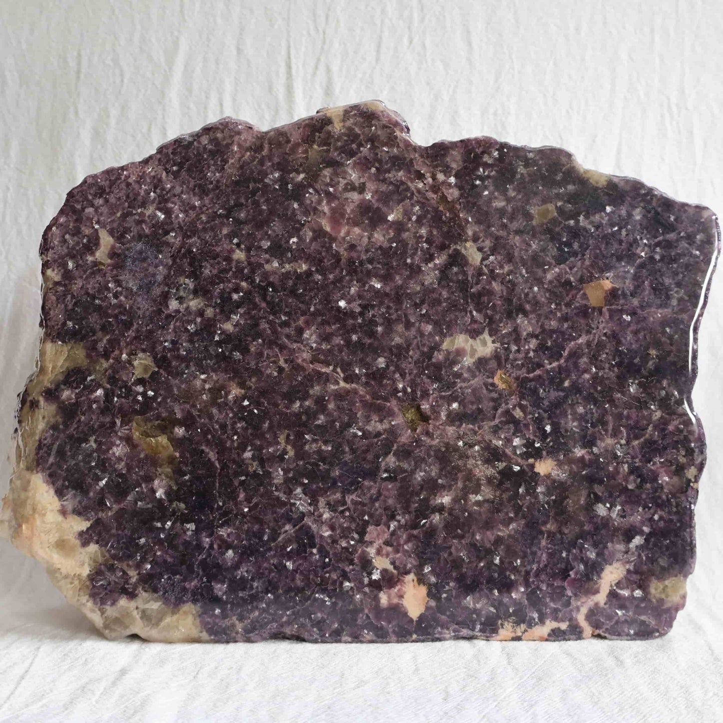 XXXL Lepidolite freestanding slab with deep plum and mauve colouring, sparkling mica detail and polished acrylic-coated face, weighing 5.09kg