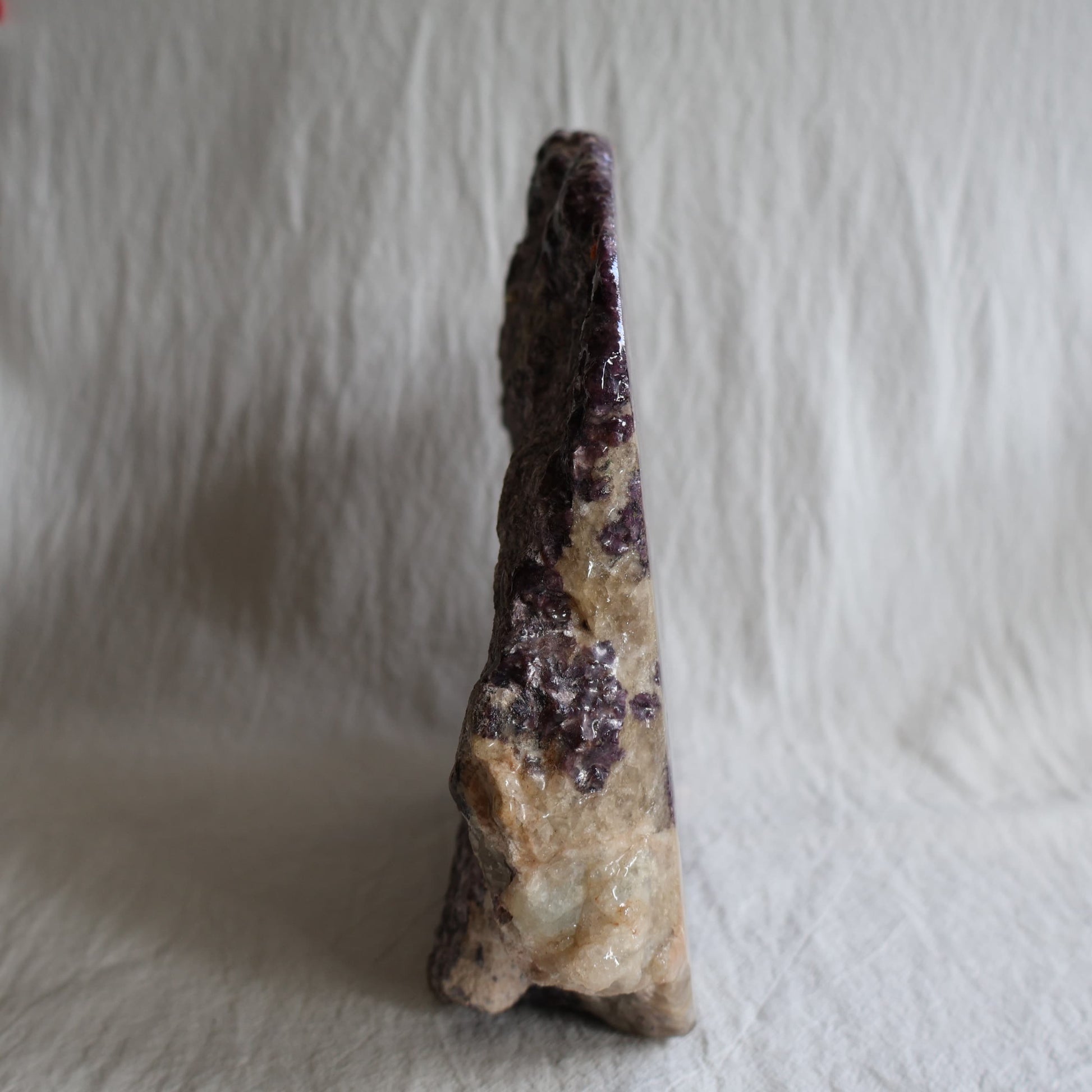 XXXL Lepidolite freestanding slab with deep plum and mauve colouring, sparkling mica detail and polished acrylic-coated face, weighing 5.09kg