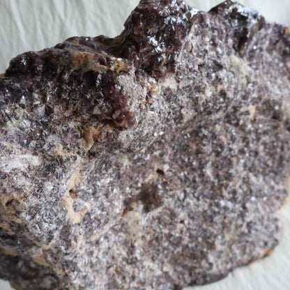 XXXL Lepidolite freestanding slab with deep plum and mauve colouring, sparkling mica detail and polished acrylic-coated face, weighing 5.09kg
