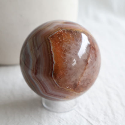 Amethyst Agate sphere with purple Amethyst crystal, sparkling druzy and intricate brown, cream and grey Agate banding.