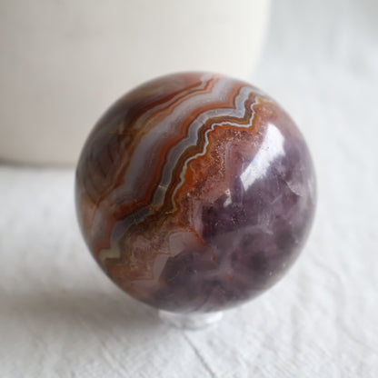 Amethyst Agate sphere with purple Amethyst crystal, sparkling druzy and intricate brown, cream and grey Agate banding.