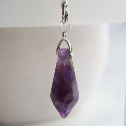 Crystal pendulum intuitively chosen from Labradorite, Rose Quartz, or Amethyst. A simple tool for intuition, reflection, and energy work