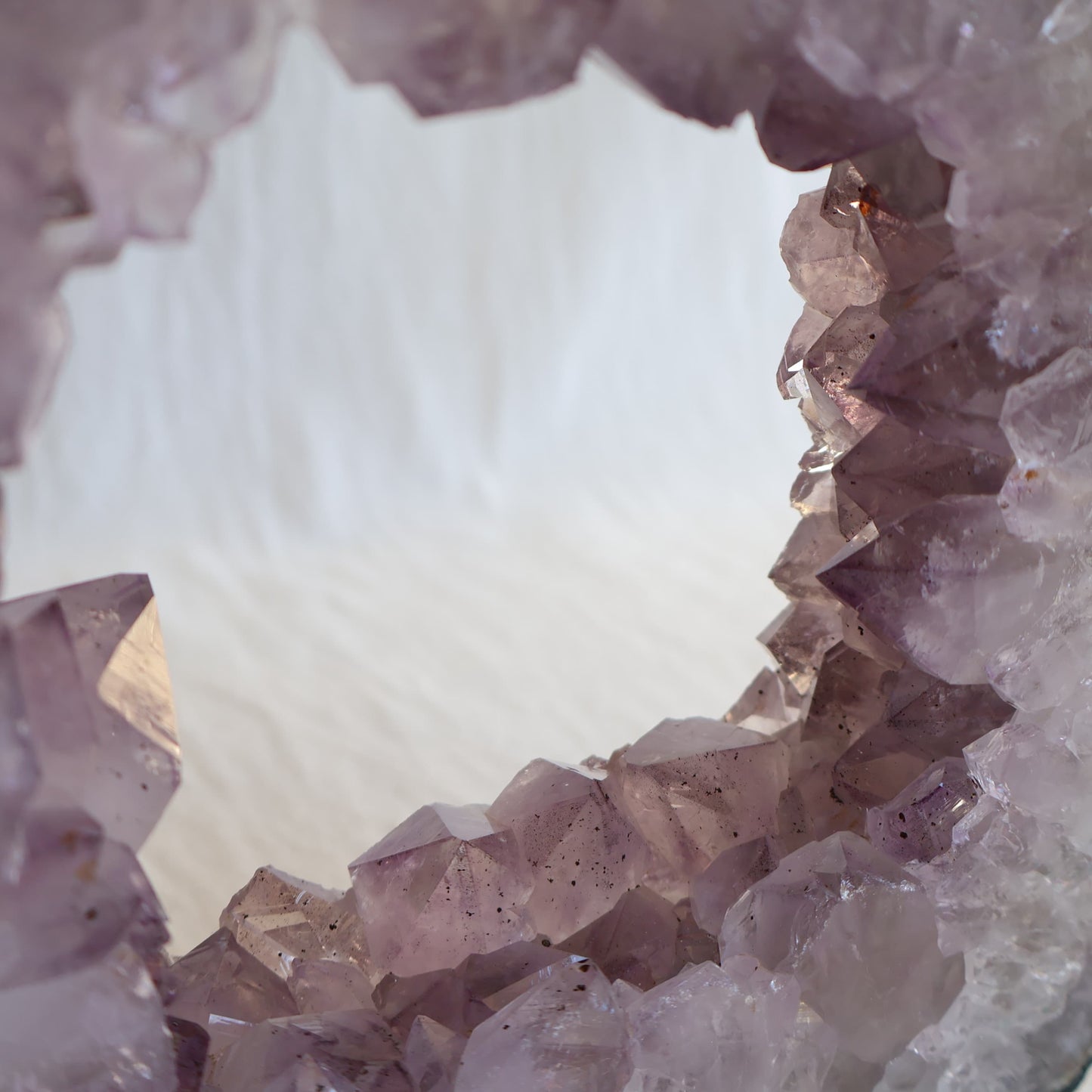amethyst portal geode with pale purple crystal points and natural hollow centre