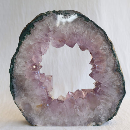 amethyst portal geode with pale purple crystal points and natural hollow centre