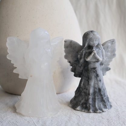 angel carving with detailed wings, clasped hands and flowing gown, 8.5cm tall