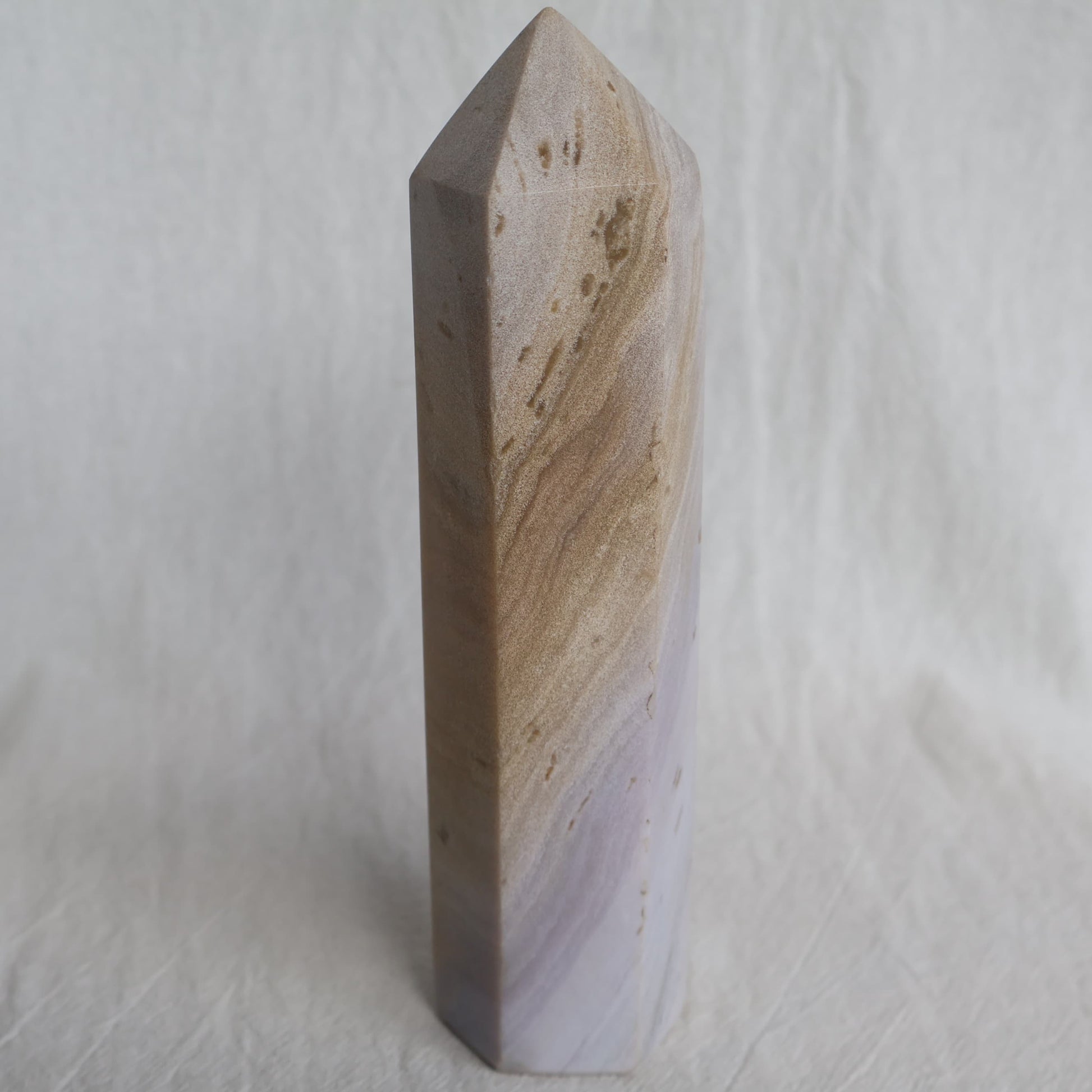 Banded Agate six-sided tower with natural lilac and earthy brown banding, 17cm tall and weighing 549g.