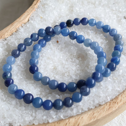 Blue Aventurine 6mm crystal bead bracelets with natural variations in soft and deeper blue tones.