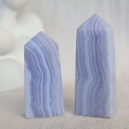 Small Blue Lace Agate obelisk with soft blue colouring and delicate natural white and blue banding.