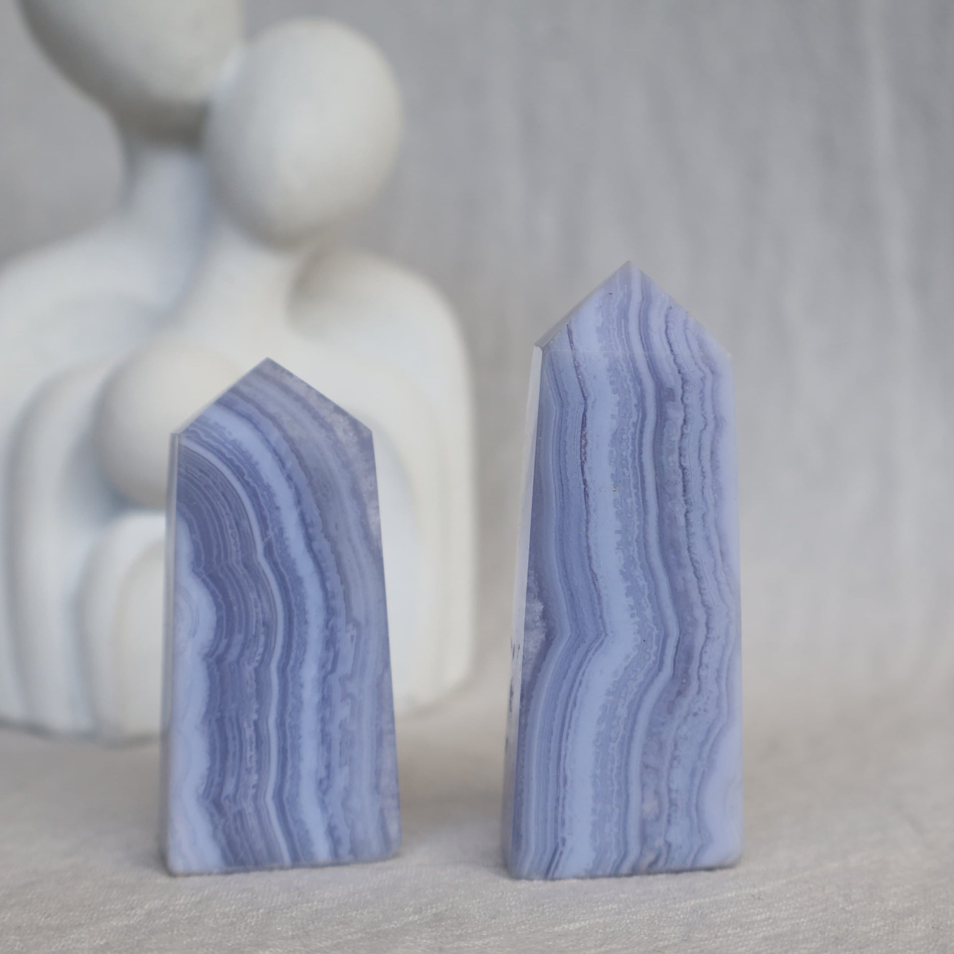 Small Blue Lace Agate obelisk with soft blue colouring and delicate natural white and blue banding.