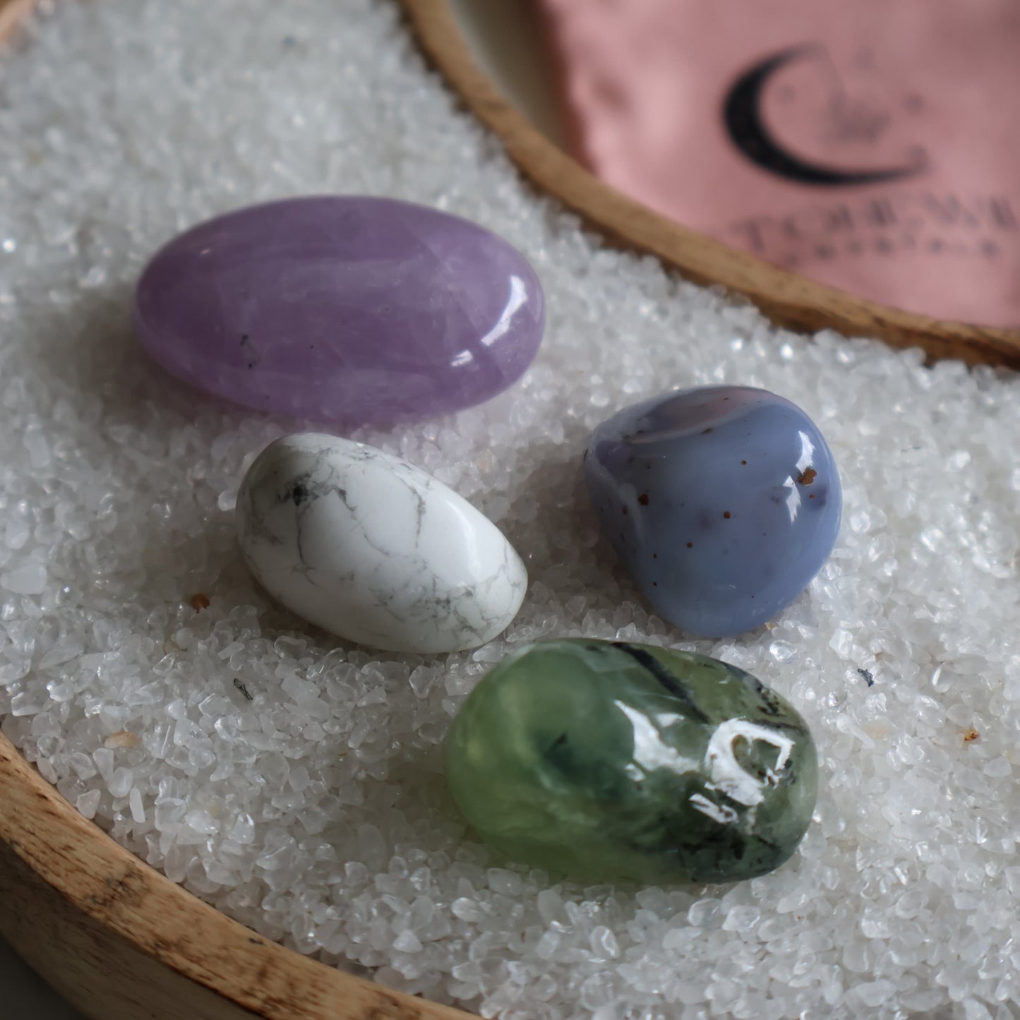 Calm and stress relief crystal tumble set with amethyst, howlite, blue agate and prehnite in a Stonewild drawstring bag