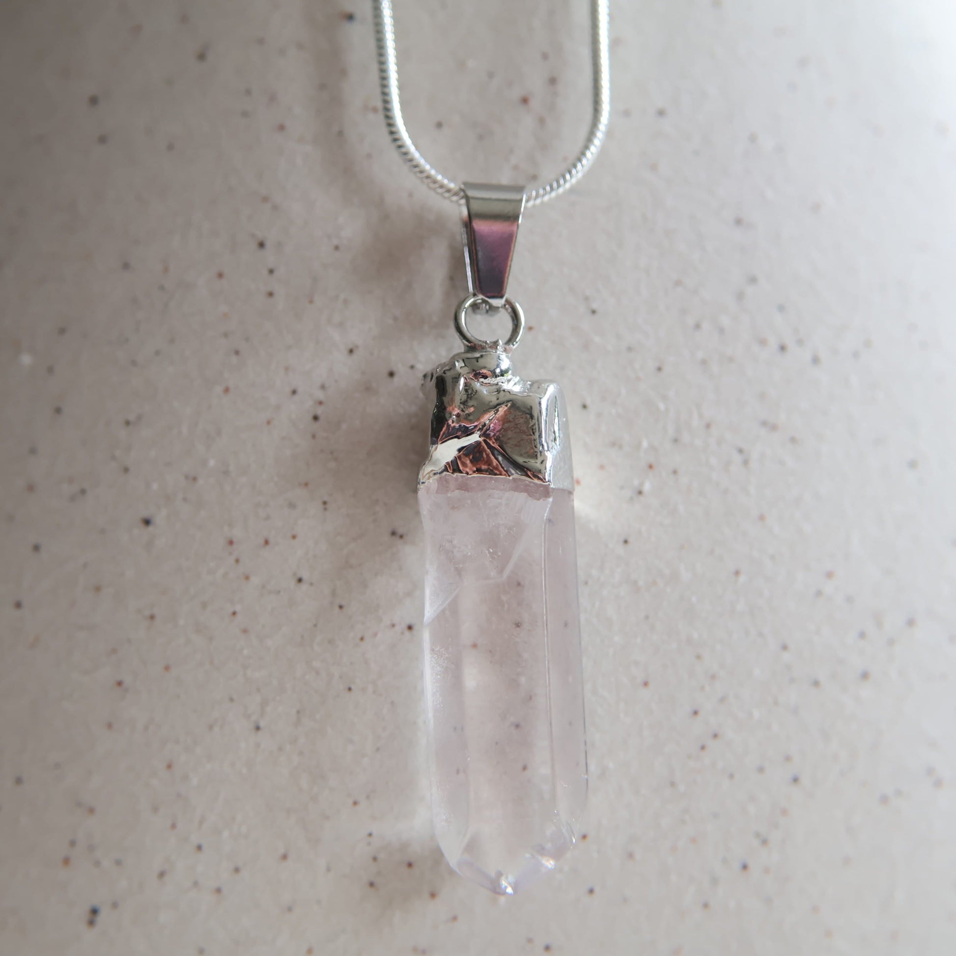 Clear quartz crystal pendant, exact piece shown