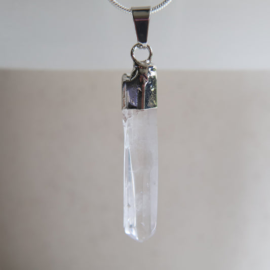 Clear quartz crystal pendant, exact piece shown