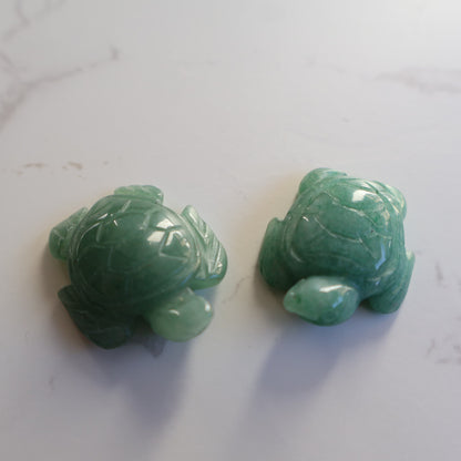 Mini crystal turtle carvings in Dream Amethyst, Green Aventurine and Tiger's Eye with polished finish and detailed shell carving.