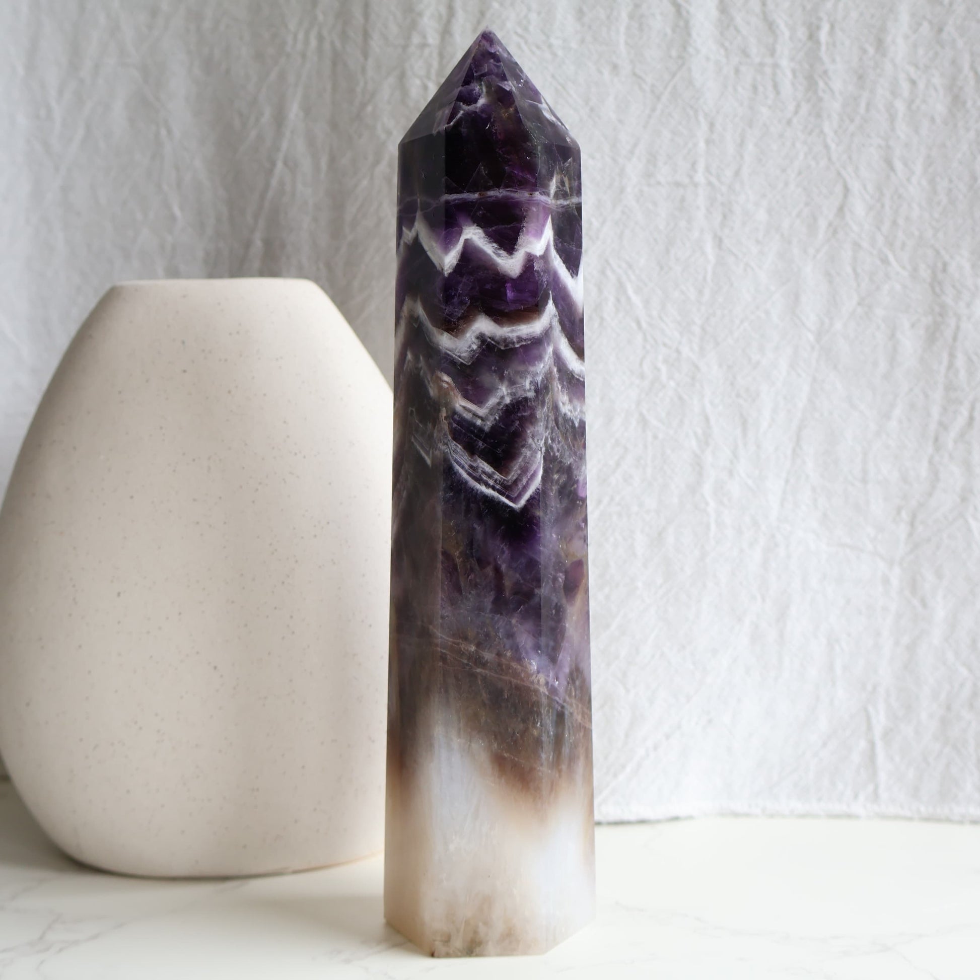 amethyst tower for calm sleep and grounding