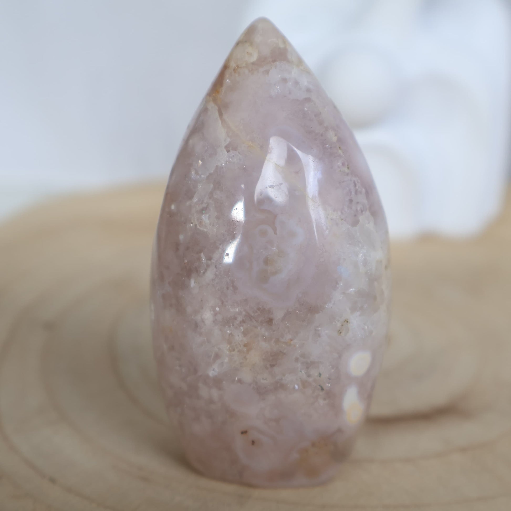 Flower Agate freeform with soft muted tones and natural floral-like plume patterns, polished into a smooth 7.5cm display piece.