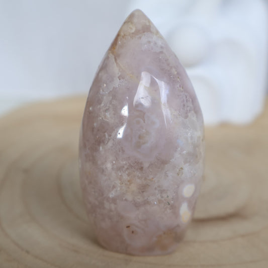 Flower Agate freeform with soft muted tones and natural floral-like plume patterns, polished into a smooth 7.5cm display piece.