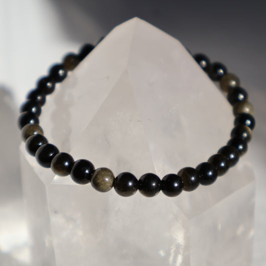 Golden Obsidian 6mm bead stretch bracelet with deep black beads and a subtle natural golden sheen.