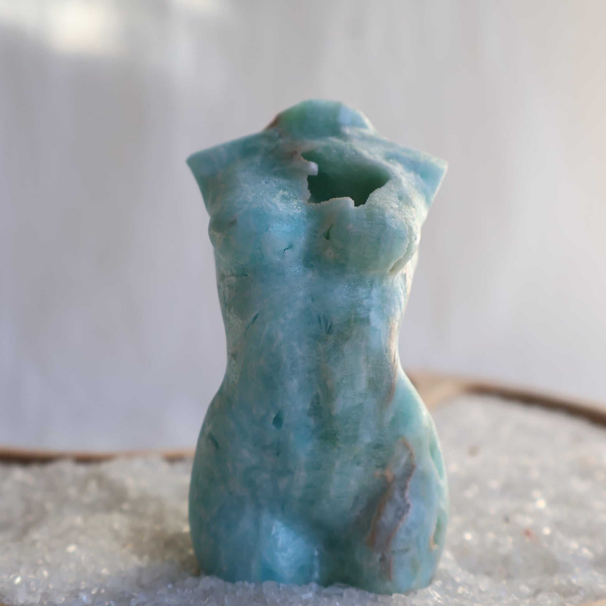 Hemimorphite Goddess carving with soft blue-green colouring, natural druzy cavities, polished feminine silhouette, and organic mineral patterns,