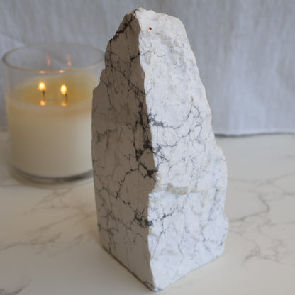 howlite freeform with polished face and natural raw side showing grey veining patterns