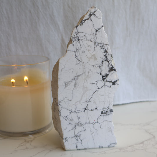 howlite freeform with polished face and natural raw side showing grey veining patterns