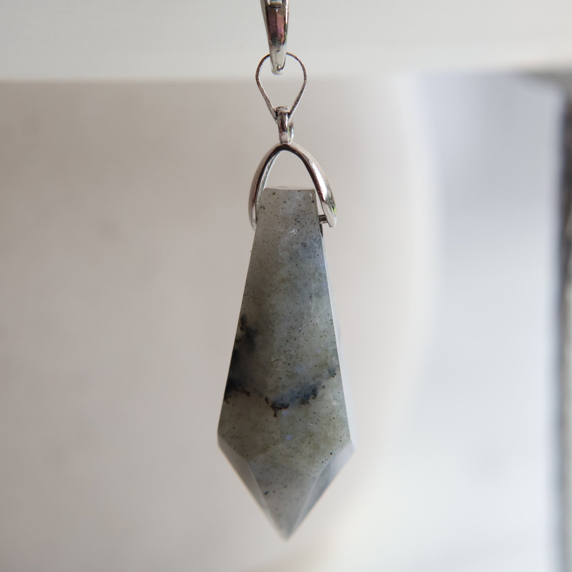 Crystal pendulum intuitively chosen from Labradorite, Rose Quartz, or Amethyst. A simple tool for intuition, reflection, and energy work