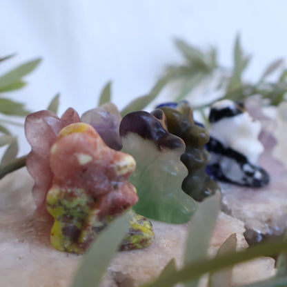 a group of mini fairy carvings in different materials