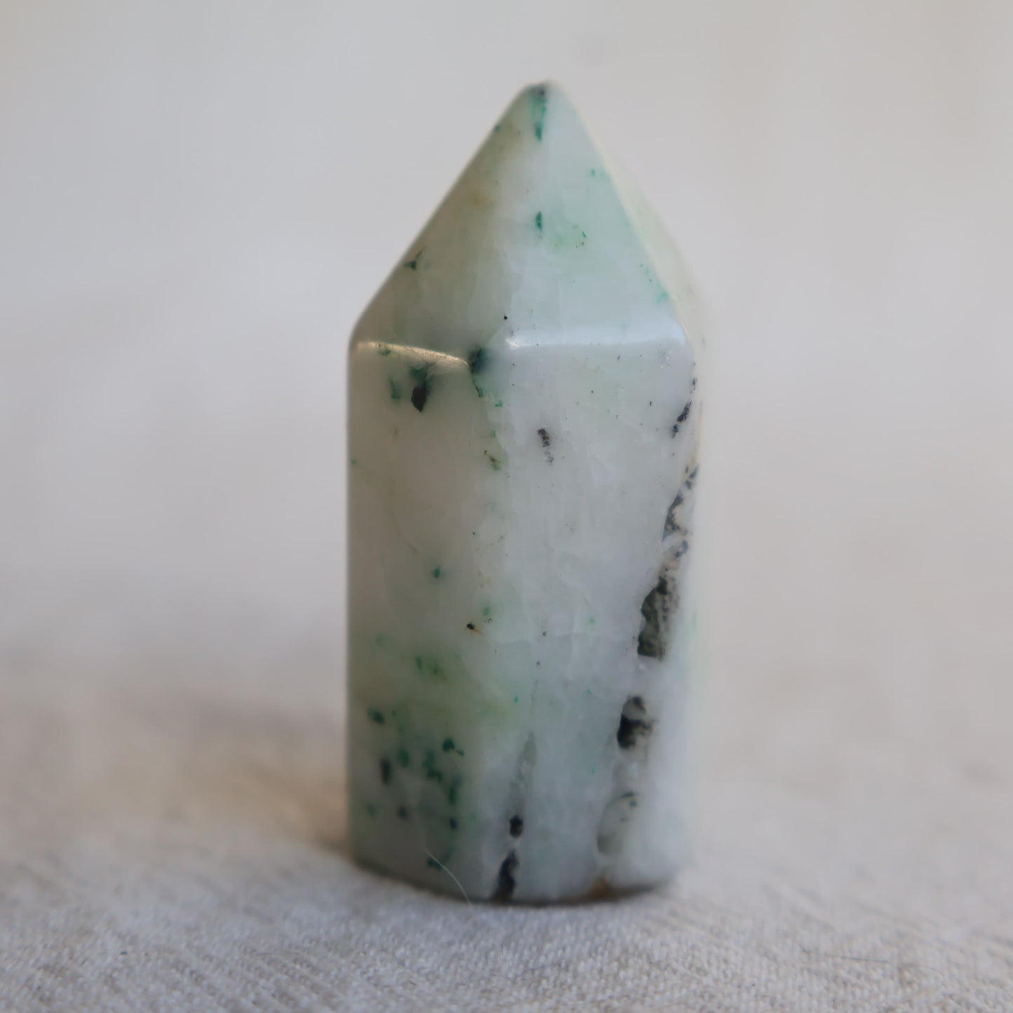 Collection of mini crystal generators available in Phoenix Stone, Rose Quartz, Pyrite, Moss Agate, and Sodalite with polished pointed tops and natural colour variations.