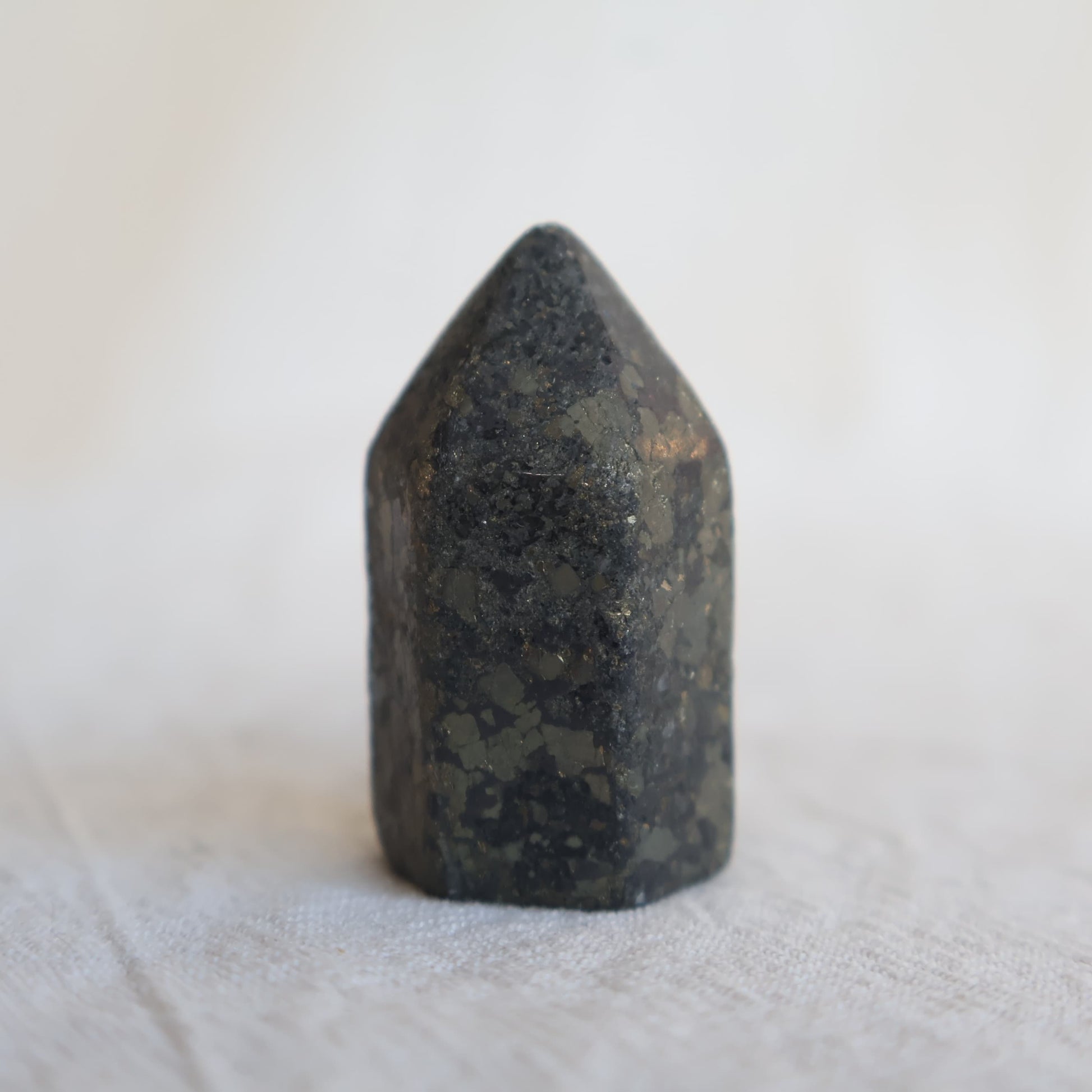 Collection of mini crystal generators available in Phoenix Stone, Rose Quartz, Pyrite, Moss Agate, and Sodalite with polished pointed tops and natural colour variations.