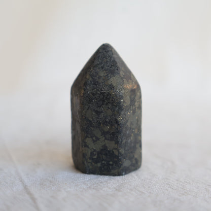 Collection of mini crystal generators available in Phoenix Stone, Rose Quartz, Pyrite, Moss Agate, and Sodalite with polished pointed tops and natural colour variations.