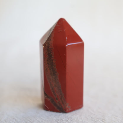 Collection of mini crystal generators available in Phoenix Stone, Rose Quartz, Pyrite, Moss Agate, and Sodalite with polished pointed tops and natural colour variations.