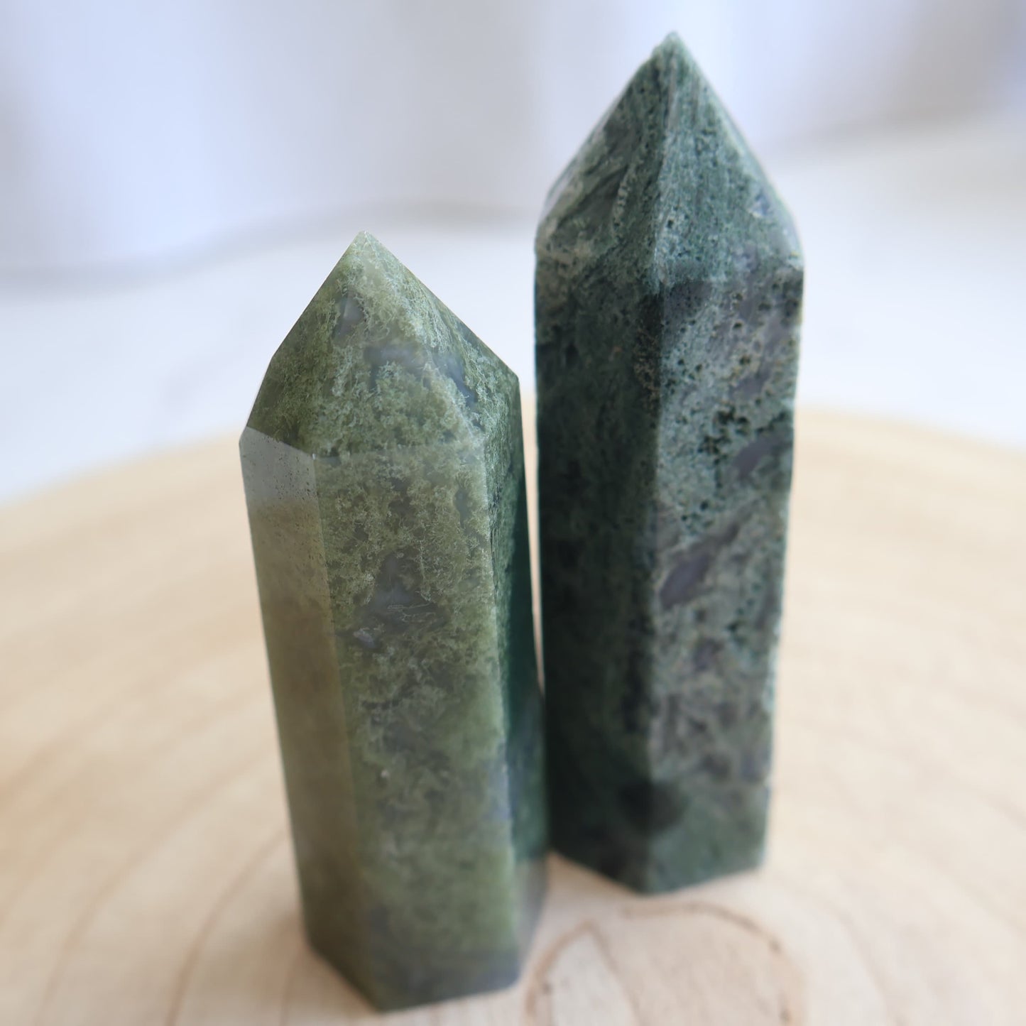 deep green moss agate generator polished point