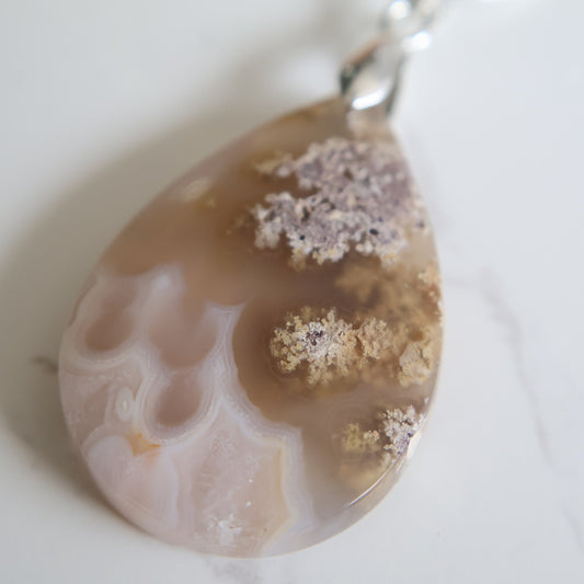 Moss agate crystal pendant with natural green inclusions, exact piece shown