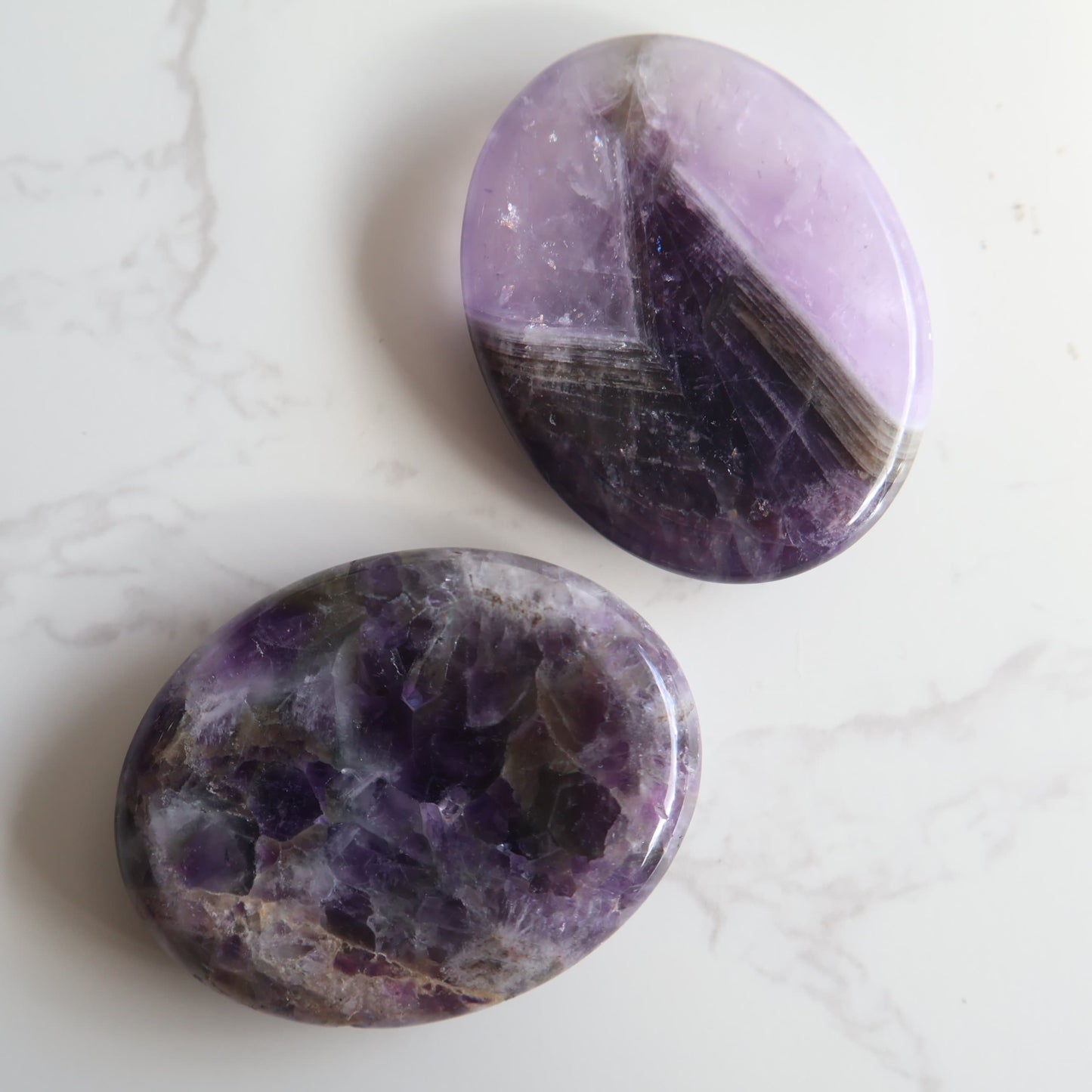 oval crystal worry stone thumb stone  amethyst stonewild 