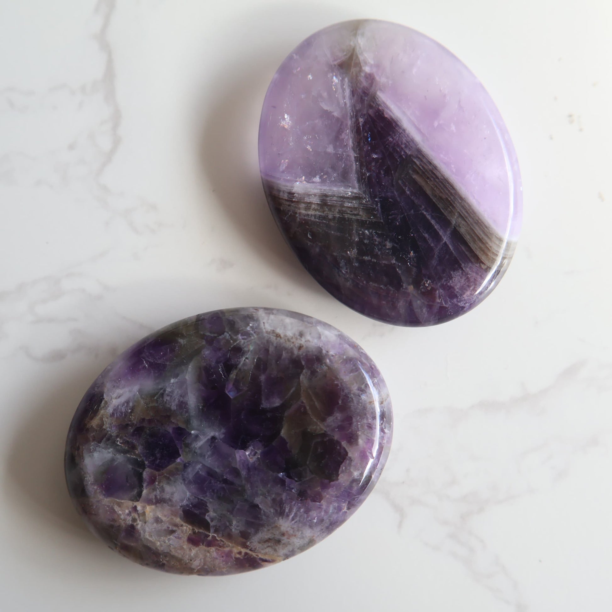 oval crystal worry stone thumb stone  amethyst stonewild 