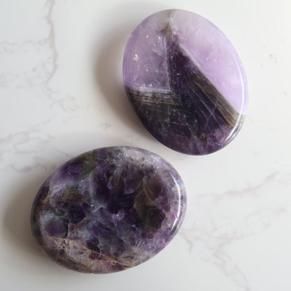 oval crystal worry stone thumb stone  amethyst stonewild 