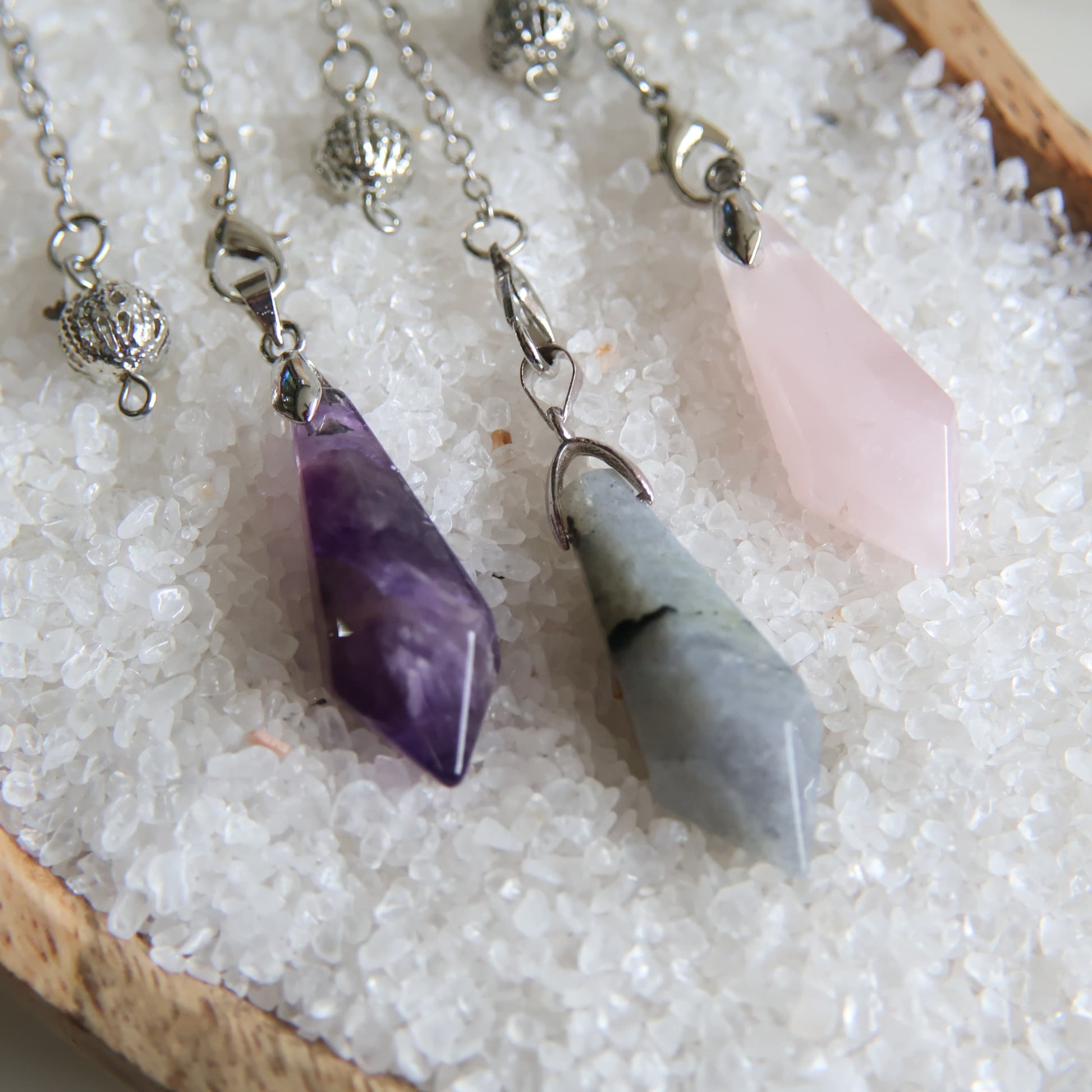 Crystal pendulum intuitively chose from Labradorite, Rose Quartz, or Amethyst. A simple tool for intuition, reflection, and energy work