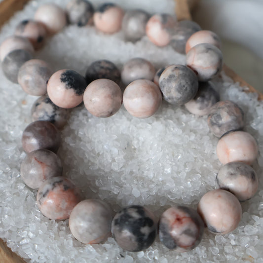 Pink Agate 12mm bead stretch bracelet with soft pink colouring and natural variations and subtle patterning throughout the beads.