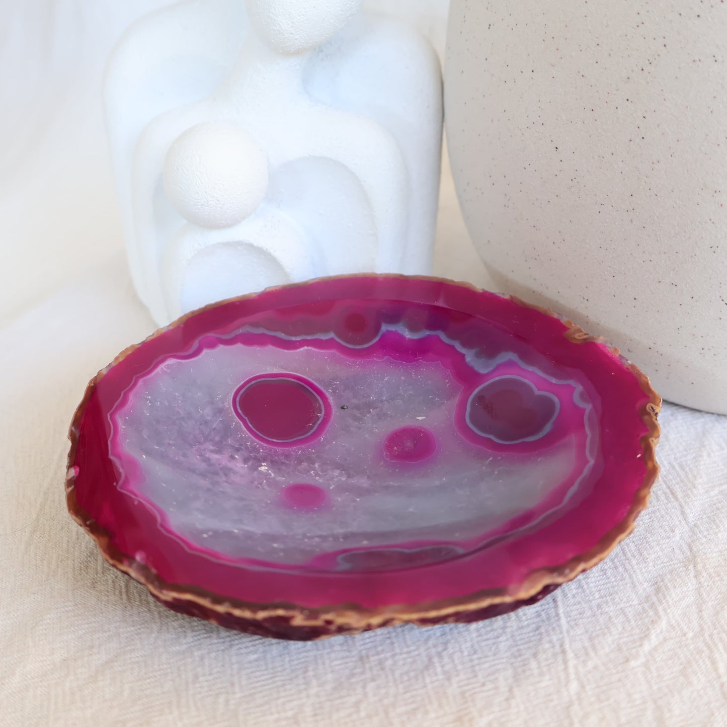 Dyed Pink Agate crystal bowl with vibrant pink colouring, natural agate banding, polished finish, and shallow round shape