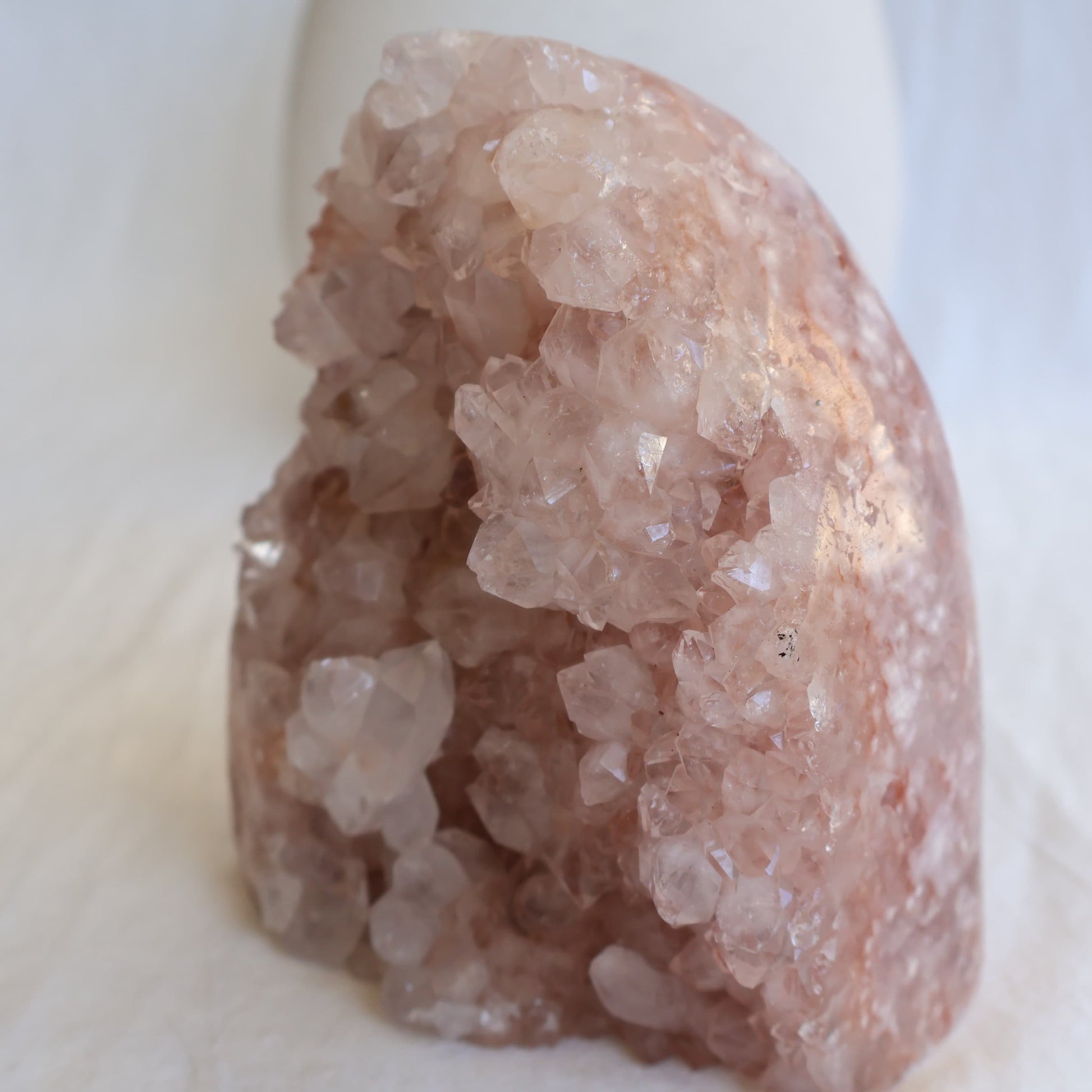 pink amethyst cluster freeform with soft blush tones and sparkling crystal points