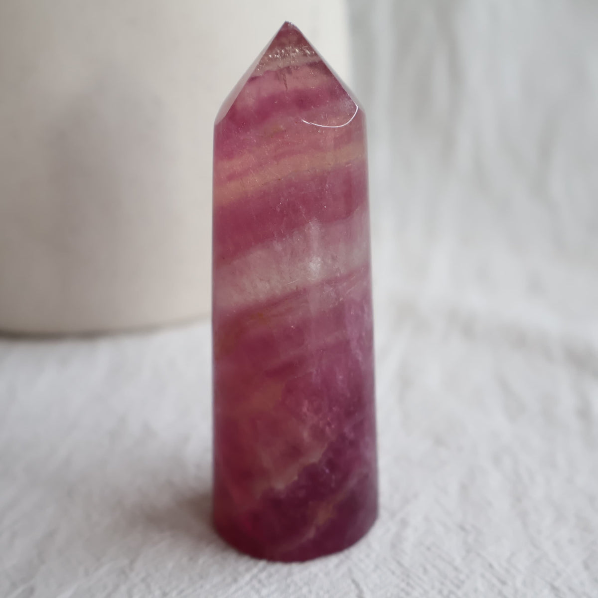 Pink Fluorite polished crystal points in varying shades of pink and purple with natural banding, available to choose by exact piece.