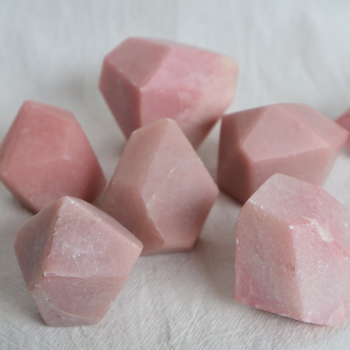 Natural Pink Opal crystal with soft blush pink colouring, milky tones and unique natural variations and markings.