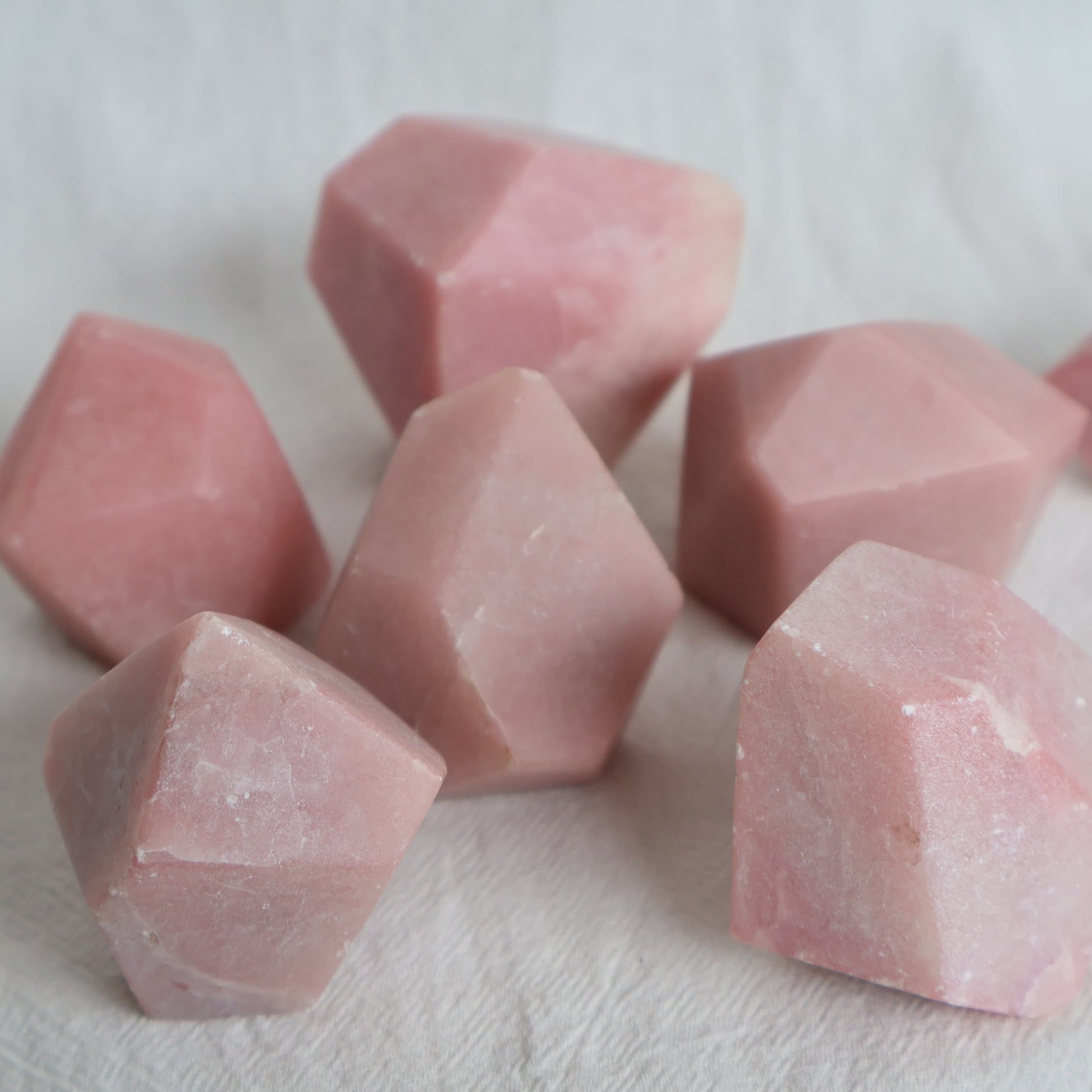 Natural Pink Opal crystal with soft blush pink colouring, milky tones and unique natural variations and markings.