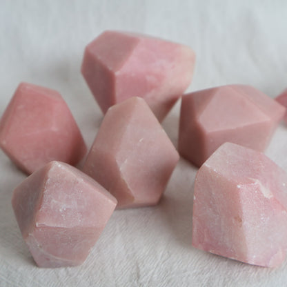Natural Pink Opal crystal with soft blush pink colouring, milky tones and unique natural variations and markings.
